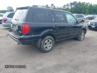2004 Honda Pilot EX with VIN 5FNYF18574B008241, listed as a IAAI auction lot 42248581 with 267,334 mi miles and . Bid and sale history available at DreamBid. Image 4.