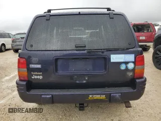 1998 Jeep Grand Cherokee with VIN 1J4FX48S1WC244308, listed as a Copart auction lot 74384714 with Not provided miles and Non repairable. Bid and sale history available at DreamBid. Image 6.