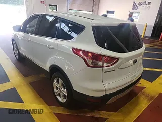 2014 Ford Escape SE z VIN 1FMCU9GX7EUC02600, wystawiony jako IAAI lot #42570755 z przebiegiem 86 871 mil mil oraz . Historia ofert i sprzedaży dostępna na DreamBid. Obrazek 15.