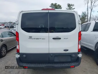 2016 Ford Transit XL z VIN 1FBZX2ZM7GKA97267, wystawiony jako IAAI lot #41520763 z przebiegiem 77 366 mil mil oraz . Historia ofert i sprzedaży dostępna na DreamBid. Obrazek 16.