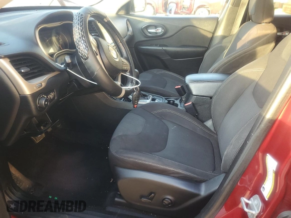 2016 Jeep Cherokee Latitude with VIN 1C4PJLCBXGW221848, listed as a Copart auction lot 51090945 with 216,945 mi miles and Salvage title. Bid and sale history available at DreamBid. Image 7.