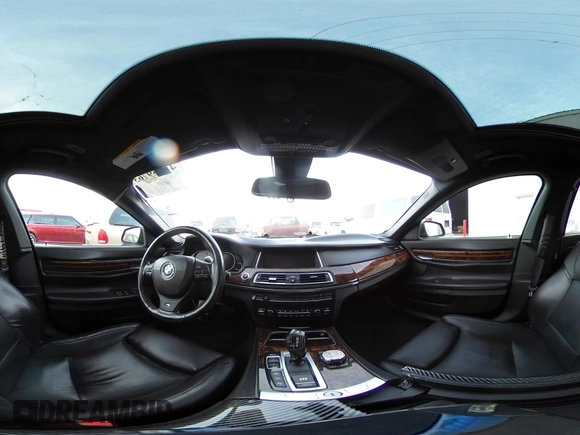 2015 BMW 7 Series 750Li xDrive with VIN WBAYF8C55FD654949, listed as a IAAI auction lot 41659763 with 91,837 mi miles and . Bid and sale history available at carsss.com. Image 18.