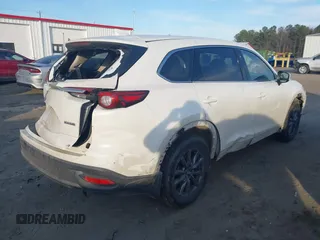 2021 Mazda CX-9 Touring with VIN JM3TCBCY1M0507696, listed as a IAAI auction lot 41681192 with 69,330 mi miles. Bid and sale history available at carsss.com. Image 4.