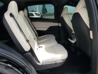 2022 Tesla Model X with VIN 7SAXCDE59NF360610, listed as a Copart auction lot 52575365 with 51,557 mi miles and Salvage Title. Bid and sale history available at carsss.com. Image 10.