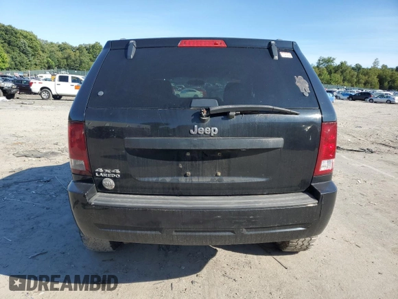 2008 Jeep Grand Cherokee Laredo with VIN 1J8GR48KX8C102393, listed as a Copart auction lot 69696834 with 173,049 mi miles and Salvage Title. Bid and sale history available at carsss.com. Image 6.
