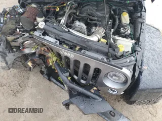 2015 Jeep Wrangler Unlimited Freedom with VIN 1C4BJWDG6FL568583, listed as a Copart auction lot 54266315 with Not provided miles and Salvage title. Bid and sale history available at DreamBid. Image 12.