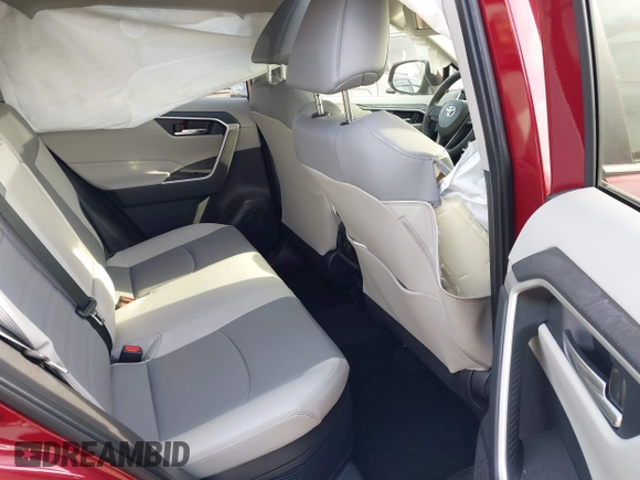 2023 Toyota RAV4 Hybrid XLE Premium z VIN JTMB6RFV8PD114927, wystawiony jako IAAI lot #41844127 z przebiegiem 14 582 mil mil oraz . Historia ofert i sprzedaży dostępna na DreamBid. Obrazek 8.
