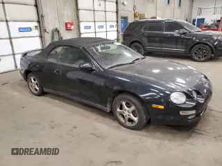 1999 Toyota Celica GT with VIN JT5FG02T7X0055063, listed as a Copart auction lot 83342194 with 166,871 mi miles and Clean Title. Bid and sale history available at carsss.com. Image 4.