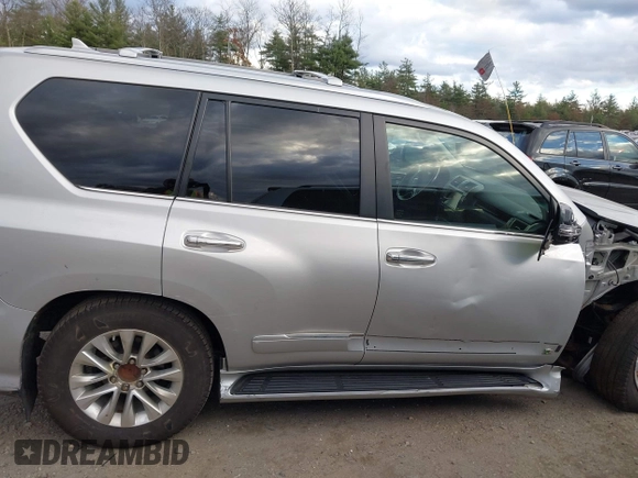 2014 Lexus GX with VIN JTJBM7FX3E5084445, listed as a IAAI auction lot 40640676 with 77,486 mi miles. Bid and sale history available at carsss.com. Image 13.