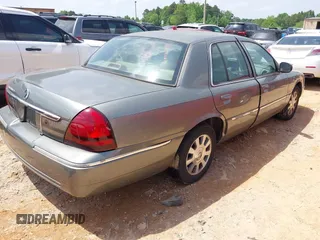 2003 Mercury Grand Marquis LS Premium z VIN 2MEHM75WX3X704496, wystawiony jako IAAI lot #42257767 z przebiegiem 200 885 mil mil oraz . Historia ofert i sprzedaży dostępna na DreamBid. Obrazek 4.
