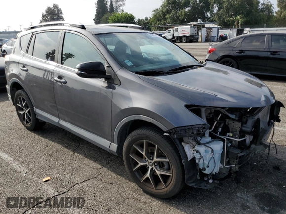 2016 Toyota RAV4 SE with VIN 2T3JFREV9GW453907, listed as a Copart auction lot 60438385 with 59,288 mi miles and Salvage title. Bid and sale history available at DreamBid. Image 4.