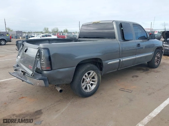 2002 GMC Sierra 1500 SLE with VIN 2GTEC19V121231109, listed as a IAAI auction lot 41906878 with 237,729 mi miles. Bid and sale history available at carsss.com. Image 4.