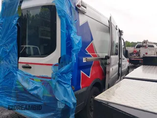 2017 Ford Transit with VIN 1FDYR2CM7HKA37738, listed as a IAAI auction lot 42231310 with 150,260 mi miles and . Bid and sale history available at DreamBid. Image 4.