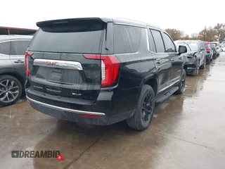 2022 GMC Yukon SLT with VIN 1GKS2BKD3NR303893, listed as a IAAI auction lot 41096447 with 72,794 mi miles. Bid and sale history available at carsss.com. Image 4.