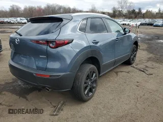 2023 Mazda CX-30 S Carbon Edition with VIN 3MVDMBCM7PM569904, listed as a Copart auction lot 52280755 with 18,963 mi miles and Salvage title. Bid and sale history available at DreamBid. Image 3.