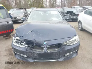 2013 BMW 3 Series 335i xDrive with VIN WBA3B9C50DJ899068, listed as a IAAI auction lot 41331622 with 156,216 mi miles. Bid and sale history available at carsss.com. Image 12.