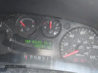 2006 Ford Taurus SE z VIN 1FAFP53U76A242715, wystawiony jako IAAI lot #42283883 z przebiegiem 128 763 mil mil oraz . Historia ofert i sprzedaży dostępna na DreamBid. Obrazek 7.
