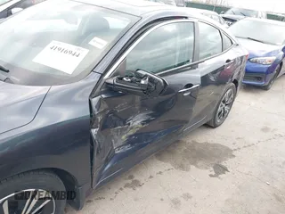 2016 Honda Civic Sedan EX-L with VIN 19XFC1F7XGE020155, listed as a IAAI auction lot 41916944 with 137,945 mi miles. Bid and sale history available at carsss.com. Image 6.