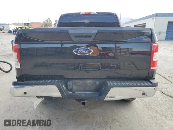 2018 Ford F-150 XL with VIN 1FTEW1C5XJKC65757, listed as a Copart auction lot 51296395 with 103,983 mi miles and Salvage Title. Bid and sale history available at carsss.com. Image 6.
