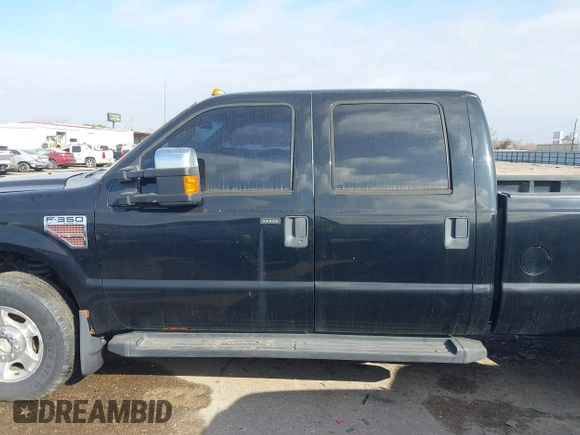 2010 Ford F-350 with VIN 1FTSW3BR4AEA99897, listed as a IAAI auction lot 41493337 with 232,318 mi miles and . Bid and sale history available at DreamBid. Image 14.