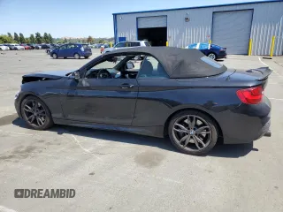 2015 BMW 2 Series M235i with VIN WBA1M1C55FV393315, listed as a Copart auction lot 58587055 with 80,998 mi miles and Salvage title. Bid and sale history available at DreamBid. Image 2.