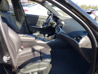 2019 BMW 3 Series 330i xDrive with VIN WBA5R7C59KFH30971, listed as a IAAI auction lot 42005244 with 59,514 mi miles and . Bid and sale history available at DreamBid. Image 5.