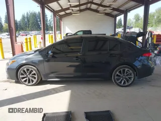 2022 Toyota Corolla SE with VIN JTDS4MCE3NJ094596, listed as a IAAI auction lot 42117369 with 92,045 mi miles and . Bid and sale history available at DreamBid. Image 14.