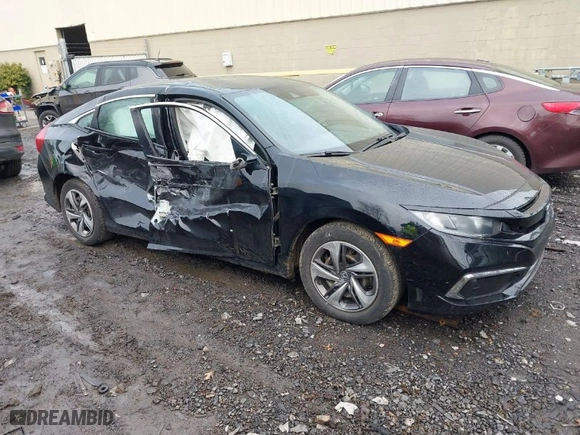 2019 Honda Civic Sedan LX with VIN 2HGFC2F60KH555359, listed as a IAAI auction lot 41626477 with 75,336 mi miles. Bid and sale history available at carsss.com. Image 1.