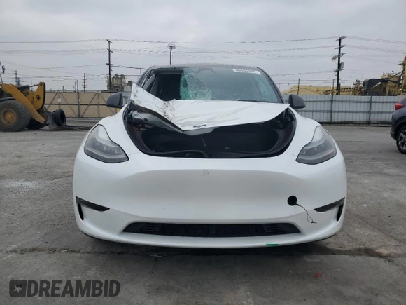 2023 Tesla Model Y Long Range with VIN 7SAYGDEE2PF860135, listed as a Copart auction lot 50380975 with 25,334 mi miles and Salvage Title. Bid and sale history available at DreamBid. Image 5.