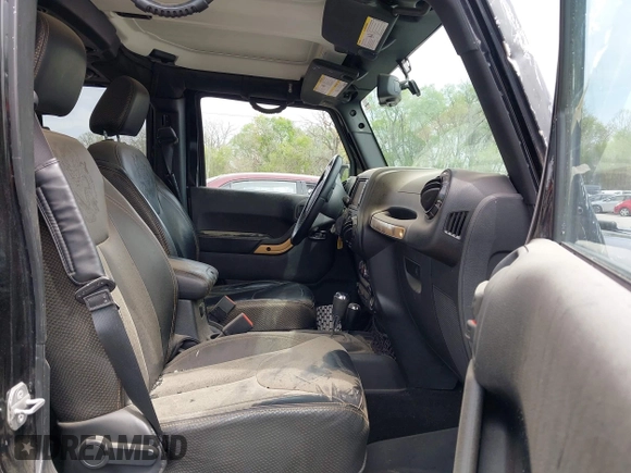 2014 Jeep Wrangler Unlimited Sahara with VIN 1C4BJWEG6EL189712, listed as a IAAI auction lot 42043053 with 108,716 mi miles. Bid and sale history available at carsss.com. Image 5.