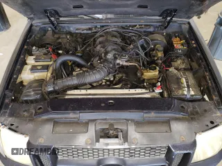 2001 Ford Explorer Sport Trac z VIN 1FMZU67E11UC81408, wystawiony jako Copart lot #64420975 z przebiegiem 185 127 mil mil oraz Szkoda całkowita • Salvage title. Historia ofert i sprzedaży dostępna na DreamBid. Obrazek 11.