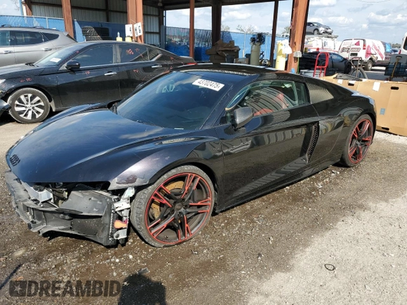2021 Audi R8 V10 z VIN WUABAAFX7M7900586, wystawiony jako Copart lot #43702475 z przebiegiem 20 246 mil mil oraz Szkoda całkowita • Salvage title. Historia ofert i sprzedaży dostępna na DreamBid. Obrazek 1.