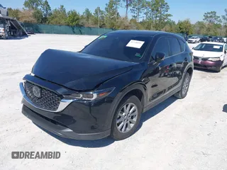 2023 Mazda CX-5 2.5 S with VIN JM3KFBAM3P0244974, listed as a IAAI auction lot 41748896 with 21,387 mi miles. Bid and sale history available at carsss.com. Image 17.