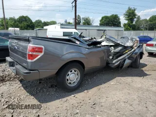 2014 Ford F-150 XL with VIN 1FTMF1CM7EKE51281, listed as a Copart auction lot 62495405 with Not provided miles and Salvage title. Bid and sale history available at DreamBid. Image 3.