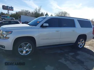 2015 Chevrolet Suburban LT with VIN 1GNSKJKC9FR717038, listed as a IAAI auction lot 41815942 with 123,095 mi miles and . Bid and sale history available at DreamBid. Image 14.