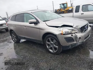 2013 Volvo XC60 T6 with VIN YV4902DZ7D2449646, listed as a IAAI auction lot 41764164 with 129,588 mi miles. Bid and sale history available at carsss.com. Image 1.