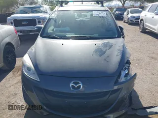 2013 Mazda 5 Sport with VIN JM1CW2BL4D0145725, listed as a IAAI auction lot 42190177 with 143,209 mi miles and . Bid and sale history available at DreamBid. Image 12.