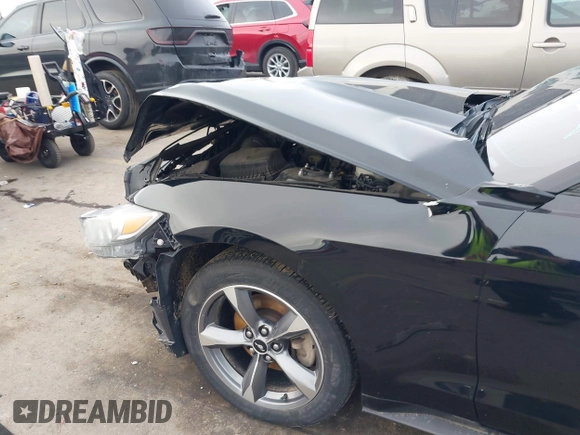 2016 Ford Mustang V6 z VIN 1FA6P8AM0G5201793, wystawiony jako IAAI lot #41620599 z przebiegiem 78 576 mil mil oraz . Historia ofert i sprzedaży dostępna na DreamBid. Obrazek 6.