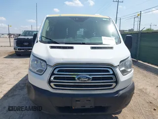 2019 Ford Transit with VIN 1FTYR1YM2KKB01764, listed as a IAAI auction lot 42216591 with 193,653 mi miles and . Bid and sale history available at DreamBid. Image 12.