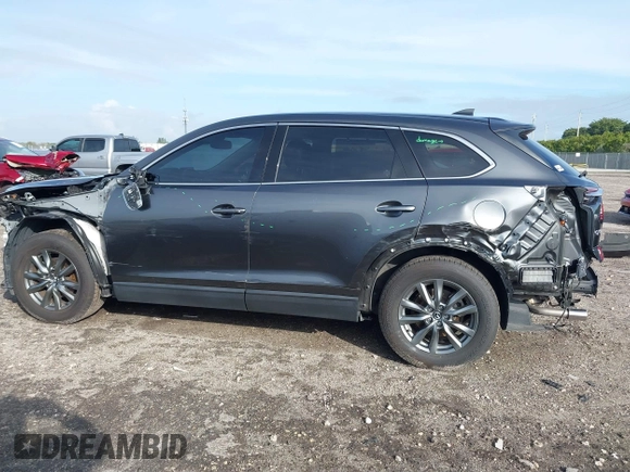 2020 Mazda CX-9 Touring z VIN JM3TCACY5L0412308, wystawiony jako IAAI lot #41208401 z przebiegiem 37 029 mil mil oraz . Historia ofert i sprzedaży dostępna na DreamBid. Obrazek 15.