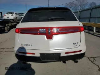 2016 Lincoln MKT EcoBoost z VIN 2LMHJ5AT5GBL01314, wystawiony jako Copart lot #88693385 z przebiegiem 75 777 mil mil oraz Szkoda całkowita • Salvage title. Historia ofert i sprzedaży dostępna na DreamBid. Obrazek 6.