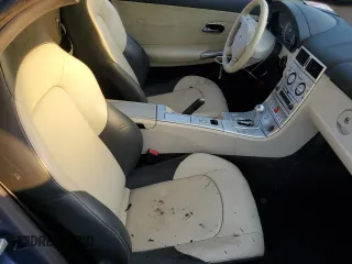 2005 Chrysler Crossfire Limited z VIN 1C3AN65L55X058376, wystawiony jako Copart lot #74088984 z przebiegiem Nie podano mil oraz Szkoda całkowita • Salvage title. Historia ofert i sprzedaży dostępna na DreamBid. Obrazek 10.
