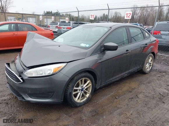 2018 Ford Focus SE with VIN 1FADP3F23JL298265, listed as a IAAI auction lot 42005754 with 134,721 mi miles. Bid and sale history available at carsss.com. Image 2.
