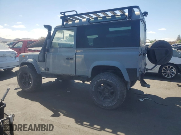 1990 Land Rover Defender z VIN SALLDVAF7HA478978, wystawiony jako Copart lot #65643315 z przebiegiem 76 116 mil mil oraz Czysty tytuł • Clean title. Historia ofert i sprzedaży dostępna na DreamBid. Obrazek 2.