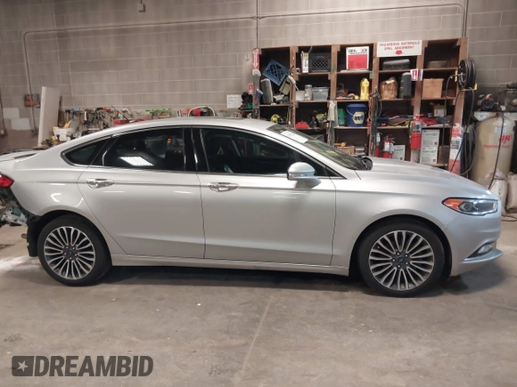 2018 Ford Fusion Titanium with VIN 3FA6P0D91JR138698, listed as a IAAI auction lot 41992522 with 95,017 mi miles and . Bid and sale history available at DreamBid. Image 14.