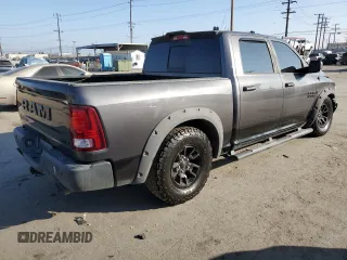 2018 Ram 1500 Rebel with VIN 1C6RR7YT1JS161619, listed as a Copart auction lot 50810955 with 49,567 mi miles and Salvage title. Bid and sale history available at DreamBid. Image 3.