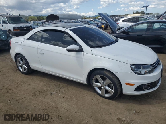2012 Volkswagen Eos Lux with VIN WVWFW7AH8CV018727, listed as a Copart auction lot 51332135 with 104,636 mi miles and Salvage Title. Bid and sale history available at DreamBid. Image 4.