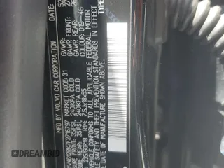 2015 Volvo XC60 T5 z VIN YV4612RK7F2716797, wystawiony jako Copart lot #58010425 z przebiegiem 49 647 mil mil oraz Szkoda całkowita • Salvage title. Historia ofert i sprzedaży dostępna na DreamBid. Obrazek 13.