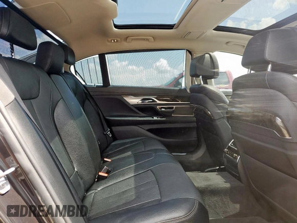 2016 BMW 7 Series 740i with VIN WBA7E2C57GG714564, listed as a Copart auction lot 64005965 with 111,598 mi miles and Salvage title. Bid and sale history available at DreamBid. Image 10.