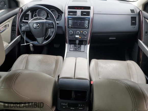 2015 Mazda CX-9 Grand Touring with VIN JM3TB2DA6F0457692, listed as a Copart auction lot 51169375 with 124,936 mi miles and Clean Title. Bid and sale history available at DreamBid. Image 8.
